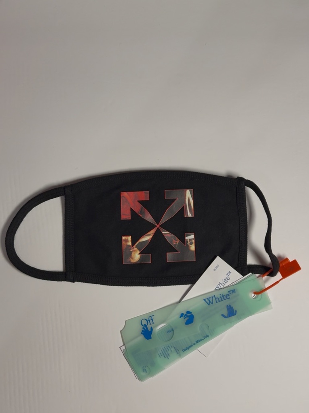 Off-White Black Face Mask with Red-Orange Arrow Motif